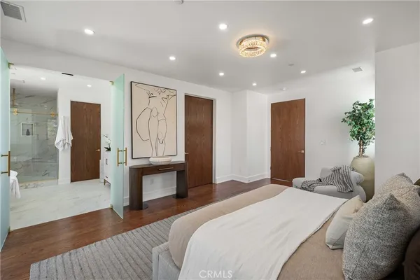 a bathroom with a double vanity sink mirror double shower and a bathtub