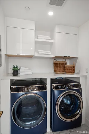 a view of a house with a yard and porch