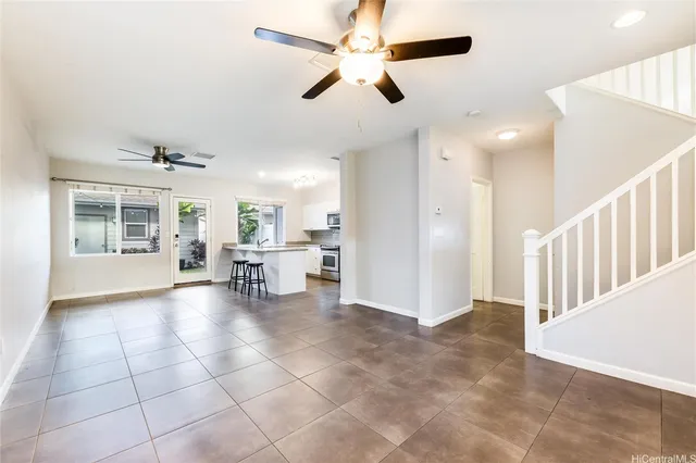 a view of livingroom with furniture and windows