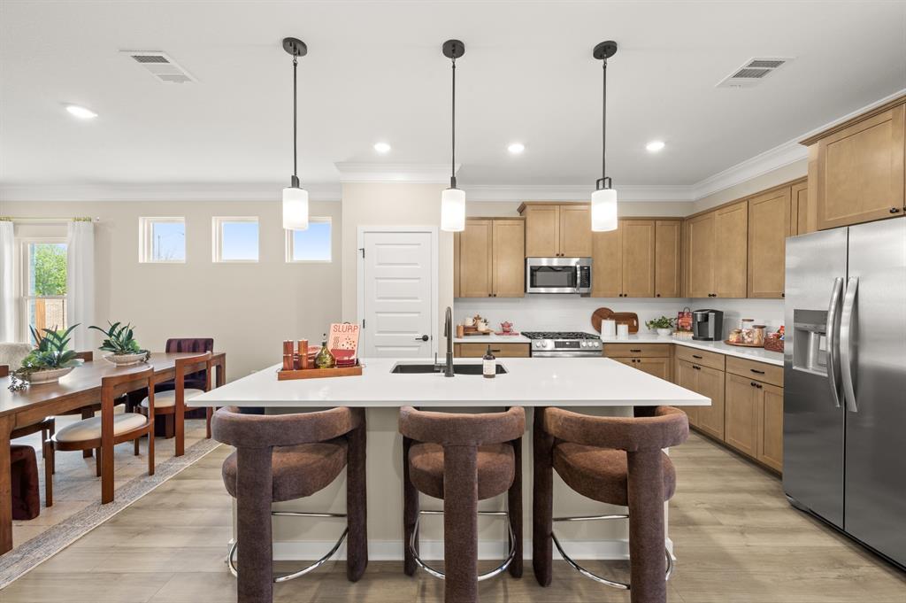 4328 Brayfield Road Fort Worth, TX 76036 - Photo 6 of 26 The Oakshire II- Kitchen and Dining Area