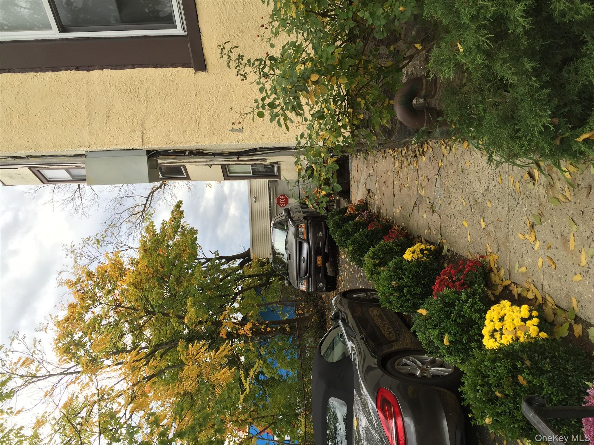 26 Coligni Avenue, Unit 12 New Rochelle, NY 10801 - Photo 18 of 18 a street view with sitting space