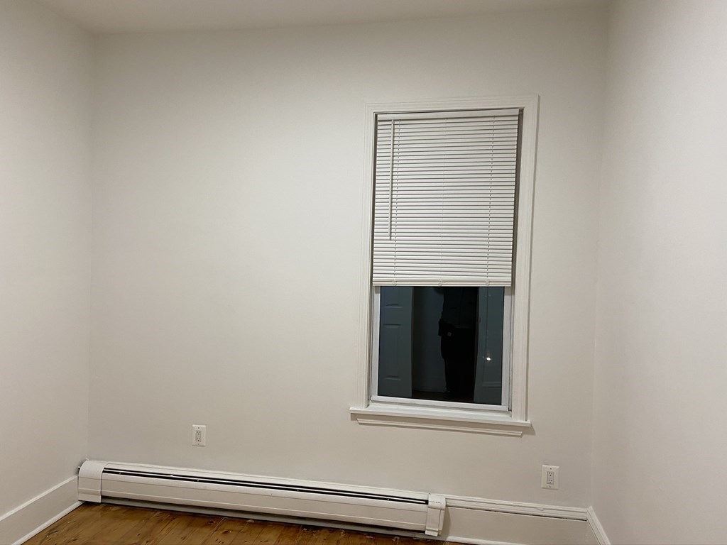 252 Windsor Street, Unit 3 Cambridge, MA 02139 - Photo 13 of 21 a view of a small space with a window