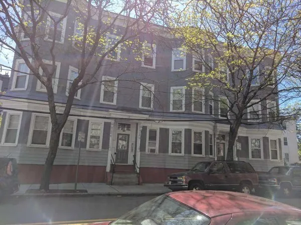 a front view of a house with yard