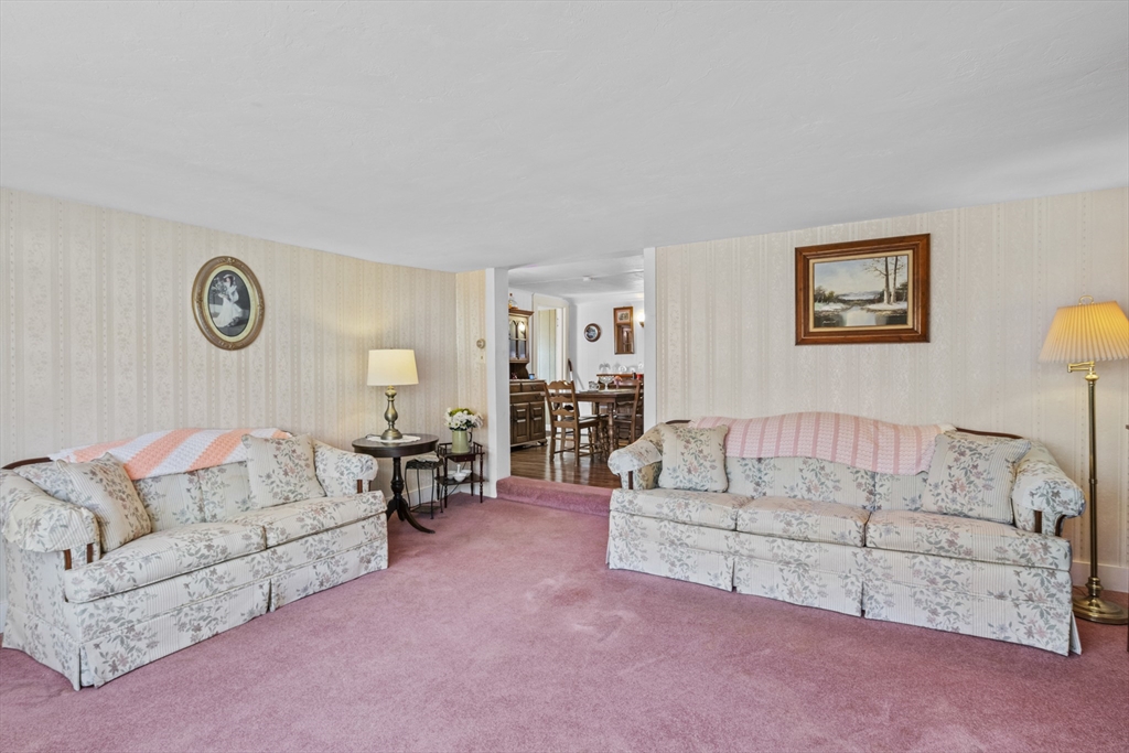 7 Wendover Road Holden, MA 01520 - Photo 11 of 28 a living room with furniture and a large window