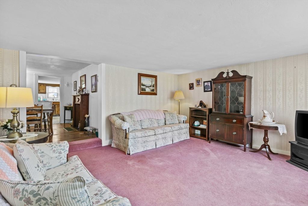 7 Wendover Road Holden, MA 01520 - Photo 12 of 28 a living room with furniture and a flat screen tv