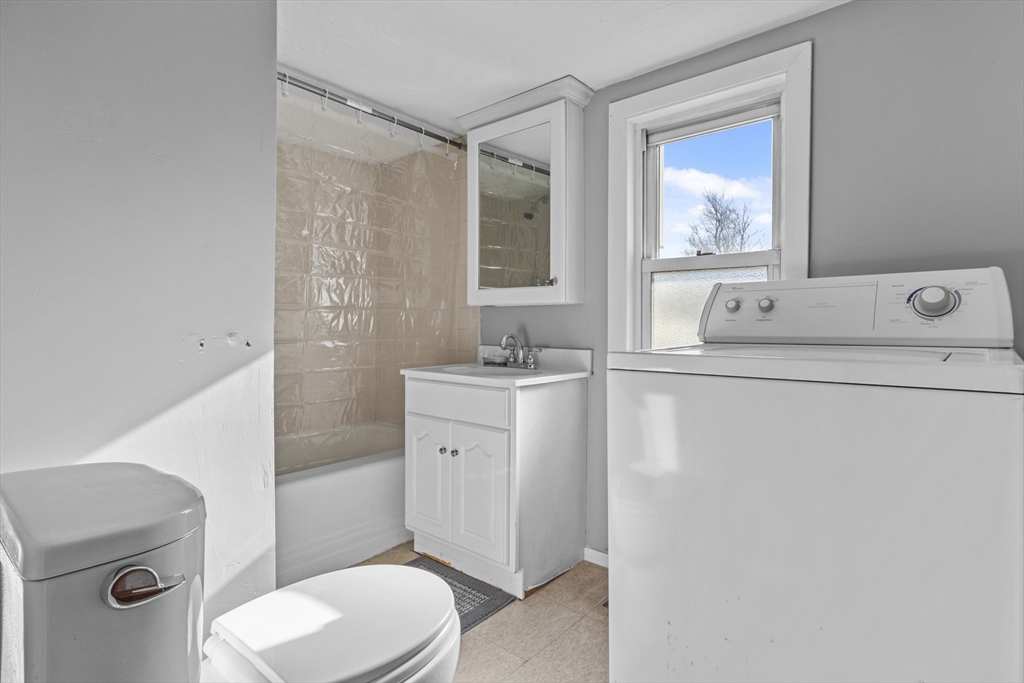 7 Wendover Road Holden, MA 01520 - Photo 16 of 28 a bathroom with a sink toilet and mirror