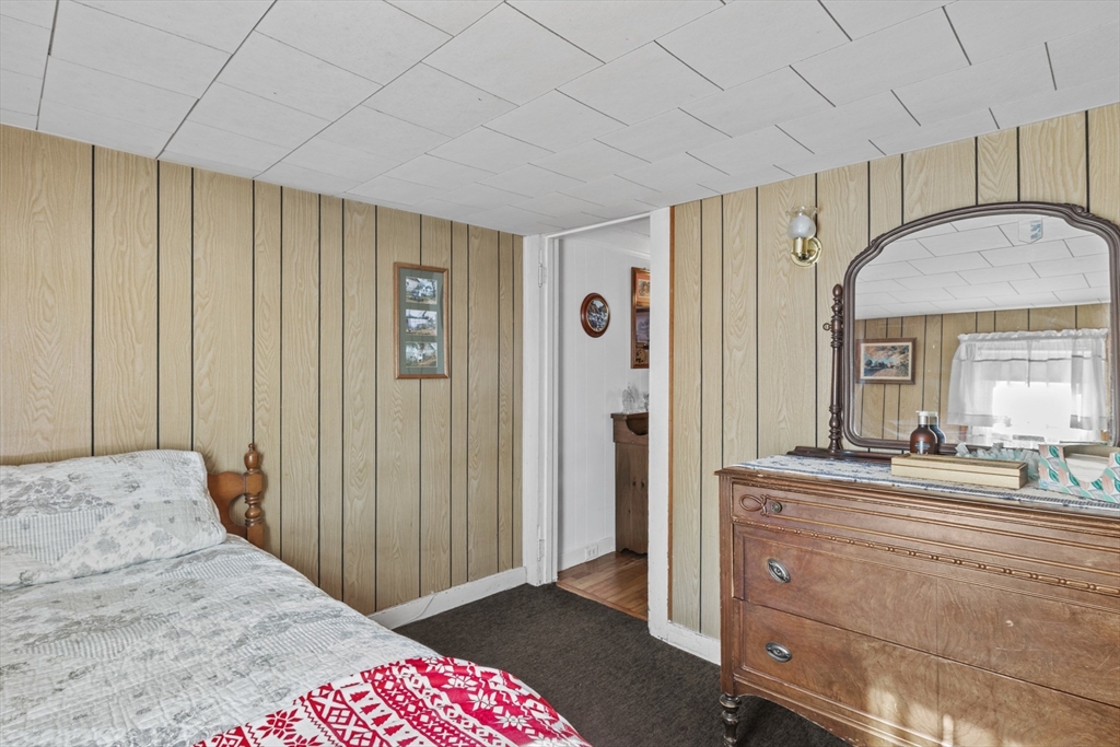 7 Wendover Road Holden, MA 01520 - Photo 18 of 28 a view of a bedroom with bed and hallway