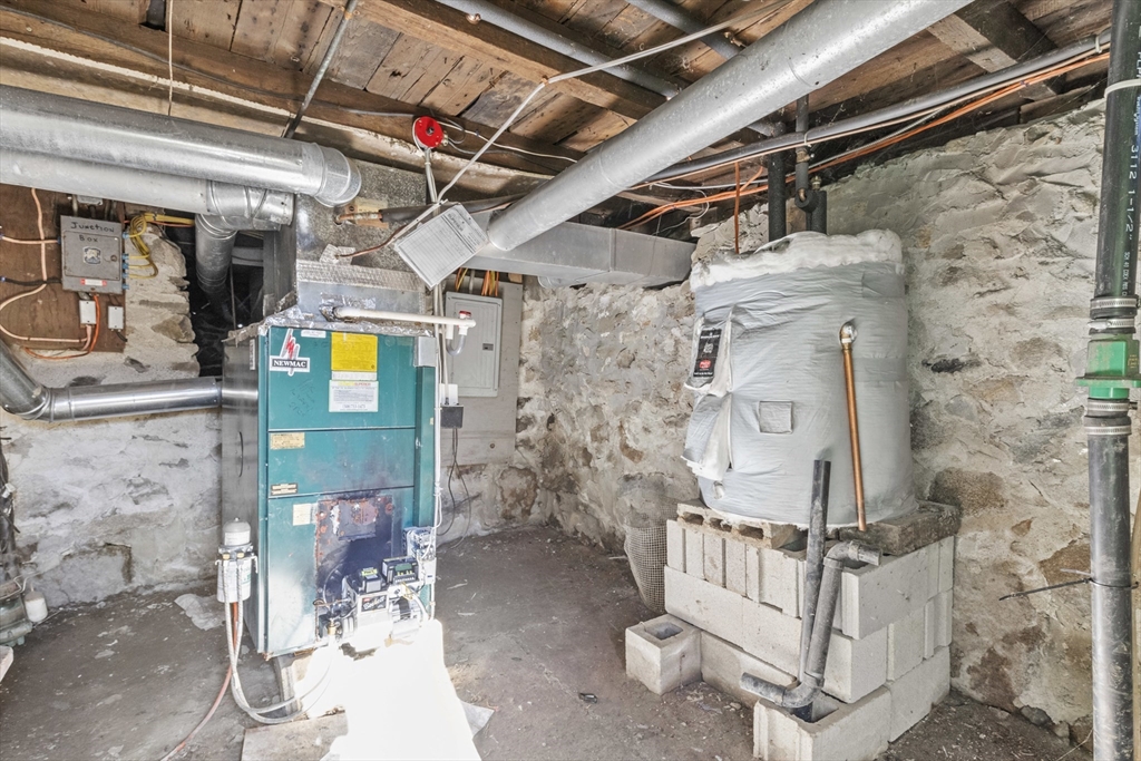 7 Wendover Road Holden, MA 01520 - Photo 19 of 28 a utility room with a wooden floor