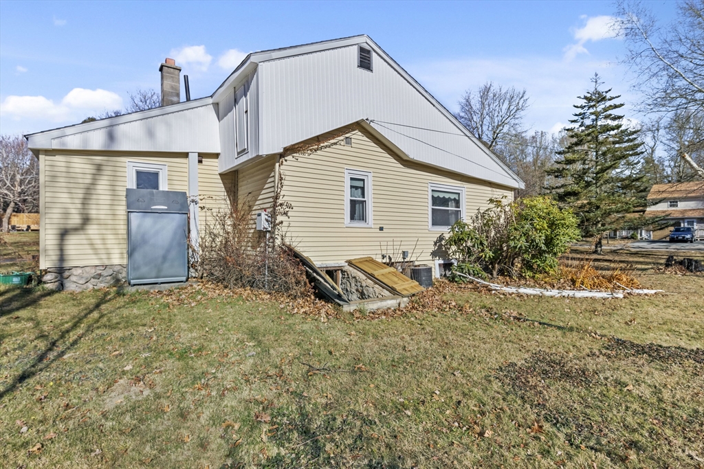 7 Wendover Road Holden, MA 01520 - Photo 23 of 28 a view of a house with a yard and garage