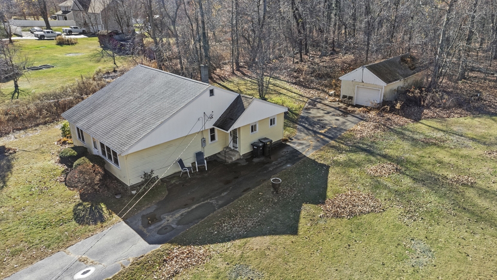 7 Wendover Road Holden, MA 01520 - Photo 26 of 28 a aerial view of a house with a yard and large tree
