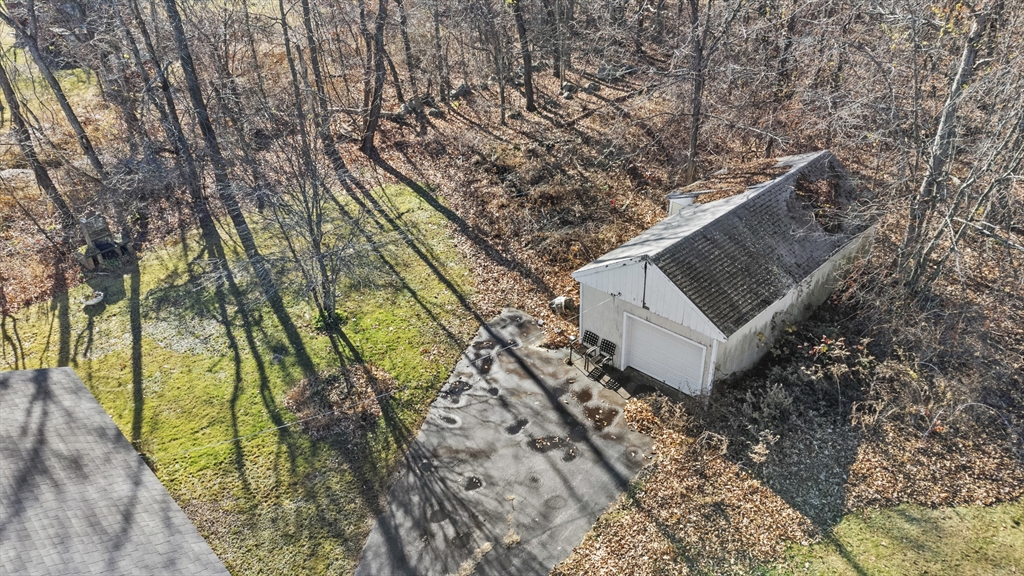 7 Wendover Road Holden, MA 01520 - Photo 27 of 28 a view of a bench in a backyard