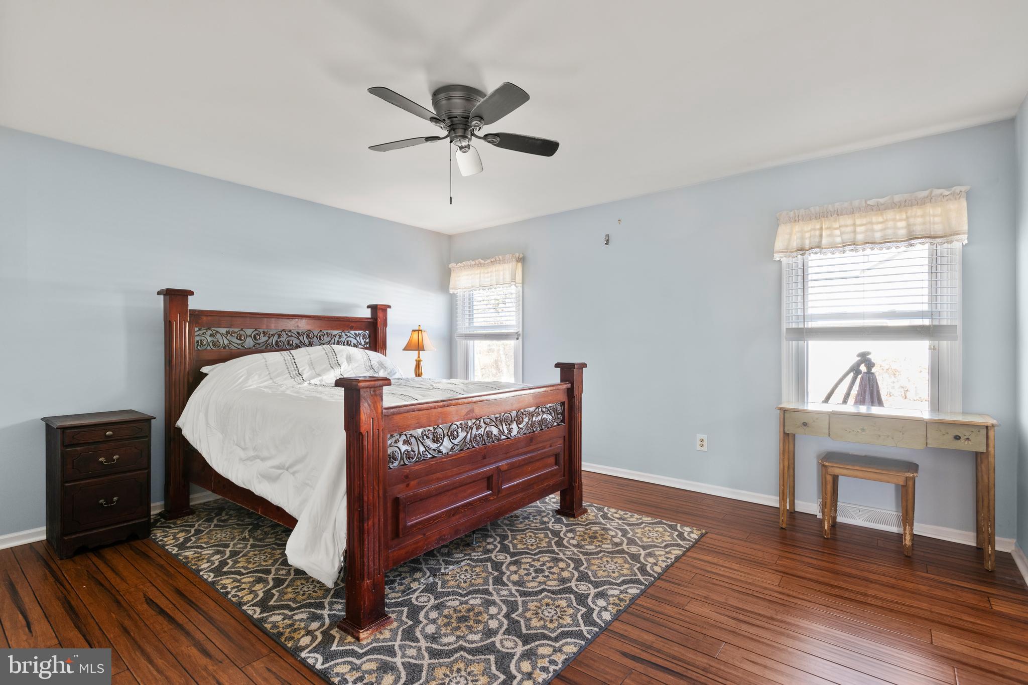 5005 Farming Ridge Boulevard Reading, PA 19606 - Photo 14 of 25 a bed sitting in a bedroom next to a window