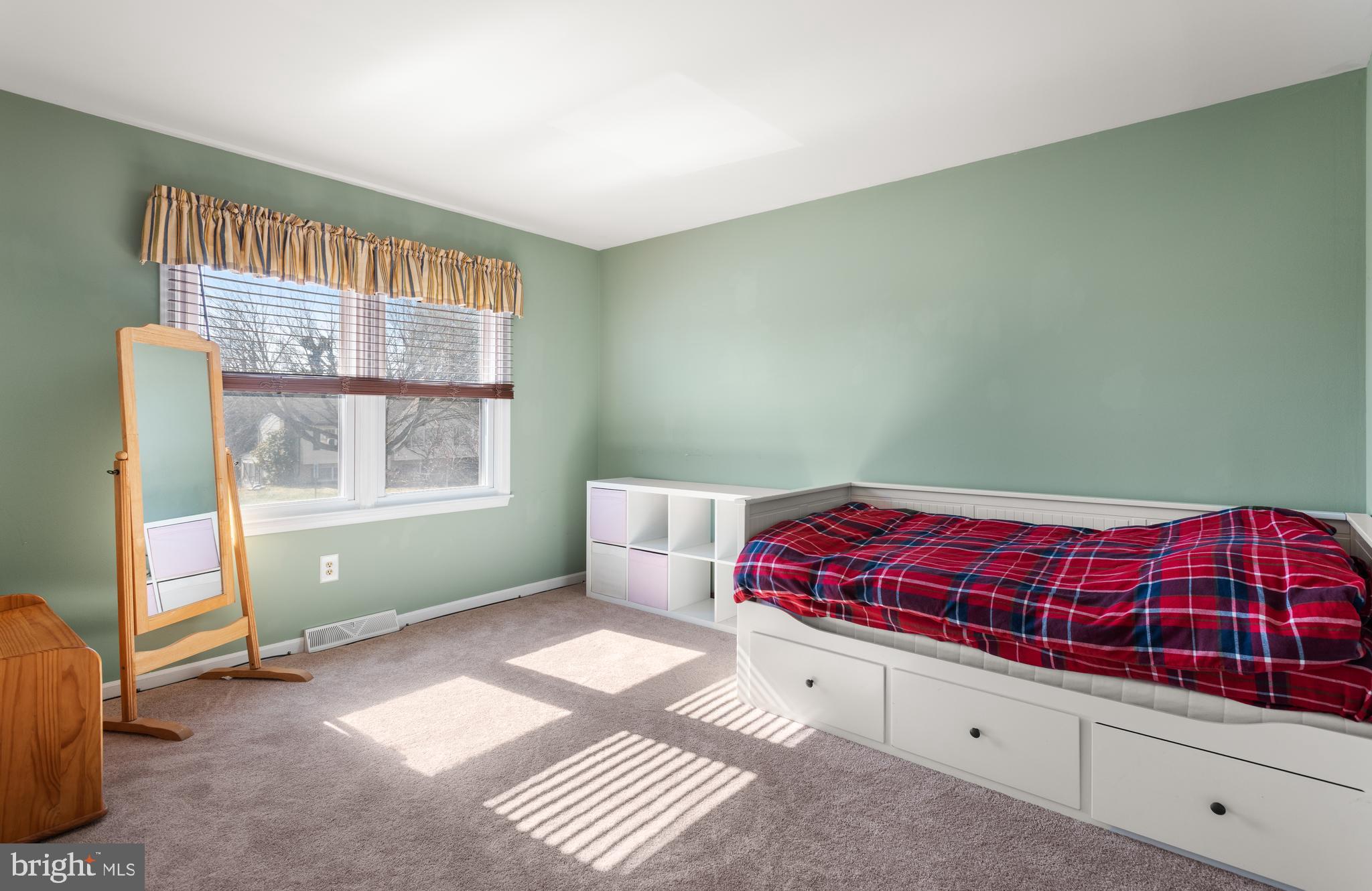 5005 Farming Ridge Boulevard Reading, PA 19606 - Photo 15 of 25 a bedroom with a bed and window