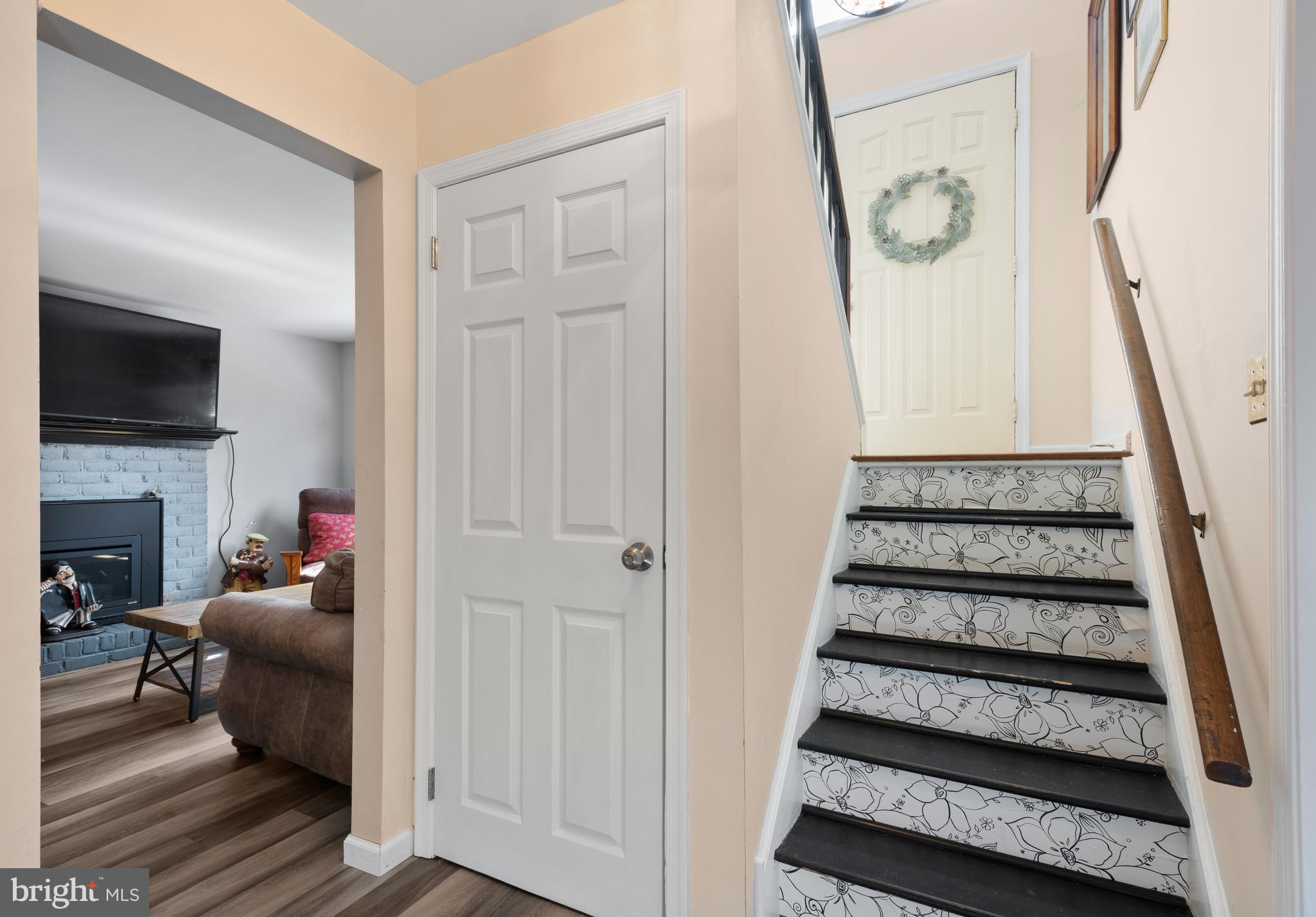 5005 Farming Ridge Boulevard Reading, PA 19606 - Photo 17 of 25 a living room with furniture and a fireplace