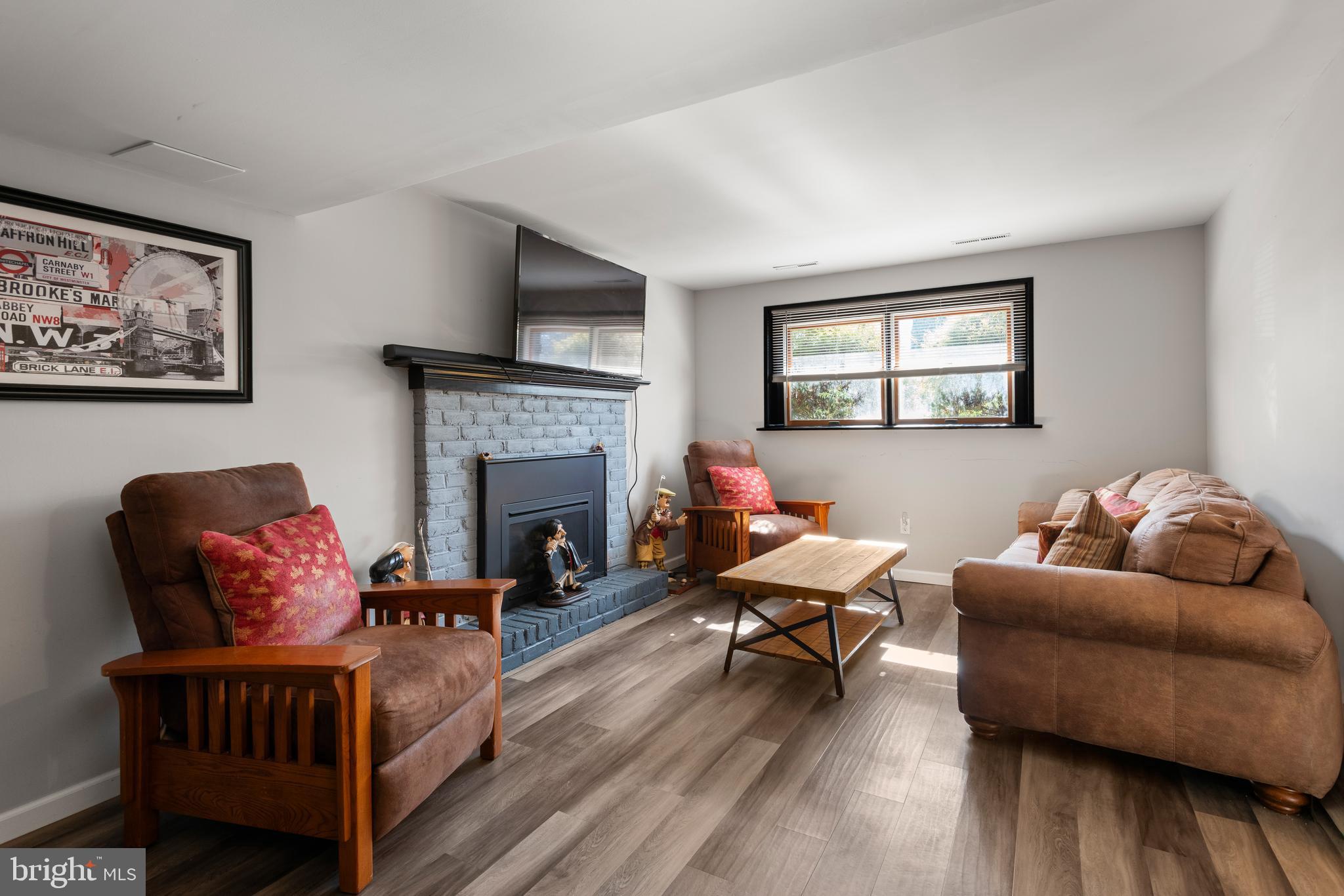 5005 Farming Ridge Boulevard Reading, PA 19606 - Photo 18 of 25 a living room with furniture and a fireplace