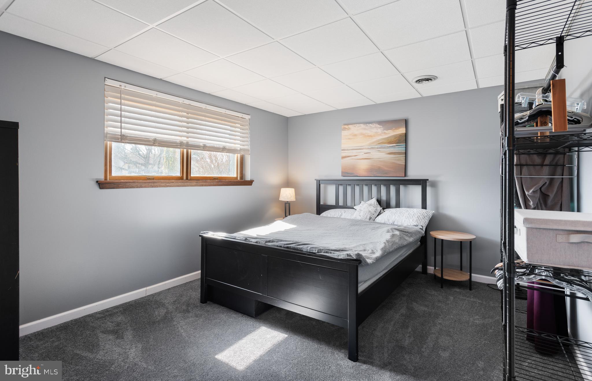 5005 Farming Ridge Boulevard Reading, PA 19606 - Photo 20 of 25 a bedroom with a bed and wooden floor