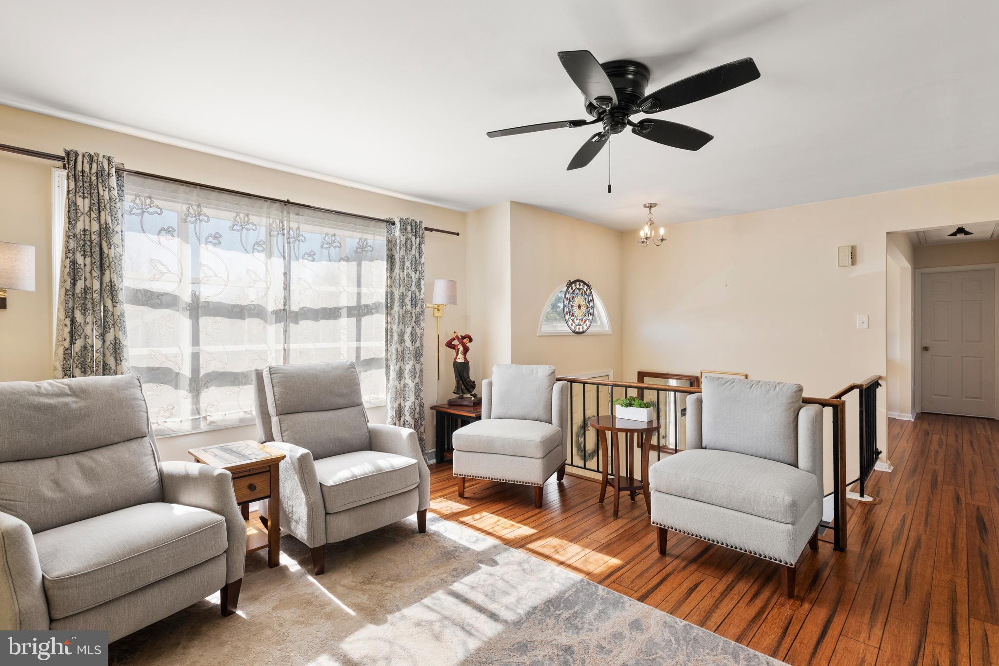 5005 Farming Ridge Boulevard Reading, PA 19606 - Photo 5 of 25 a living room with furniture and a large window