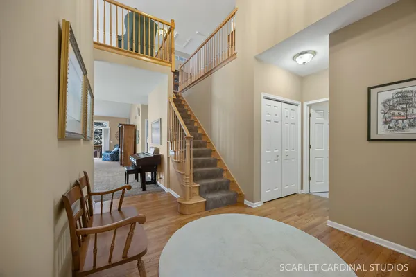 a view of a livingroom with furniture and hardwood floor