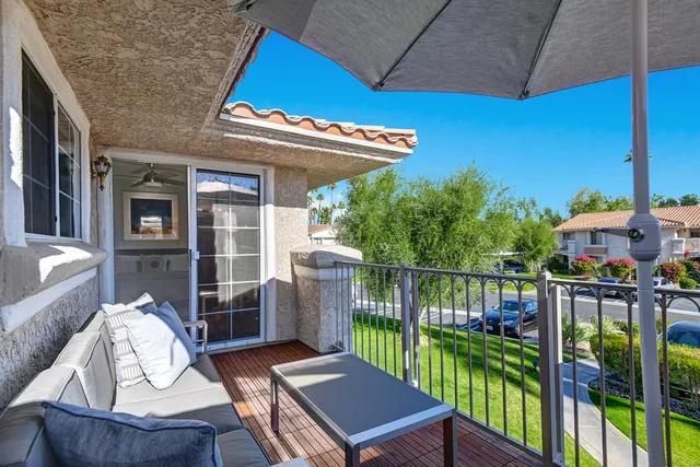 a view of a house with a backyard and pool table