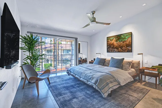 a bathroom with a toilet and shower