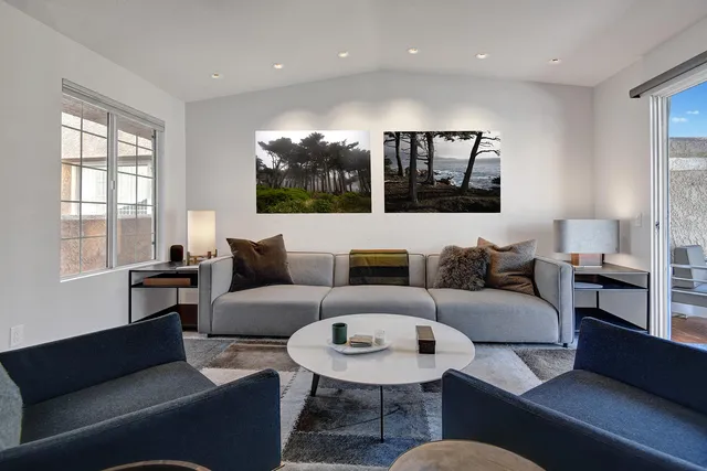 a view of a dining room with furniture and window