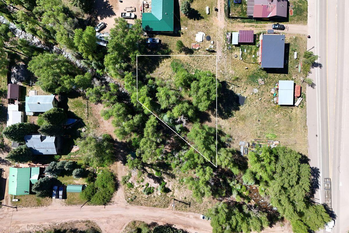 27 North Commercial Street Rico, CO 81332 - Photo 6 of 17 an aerial view of residential houses with outdoor space