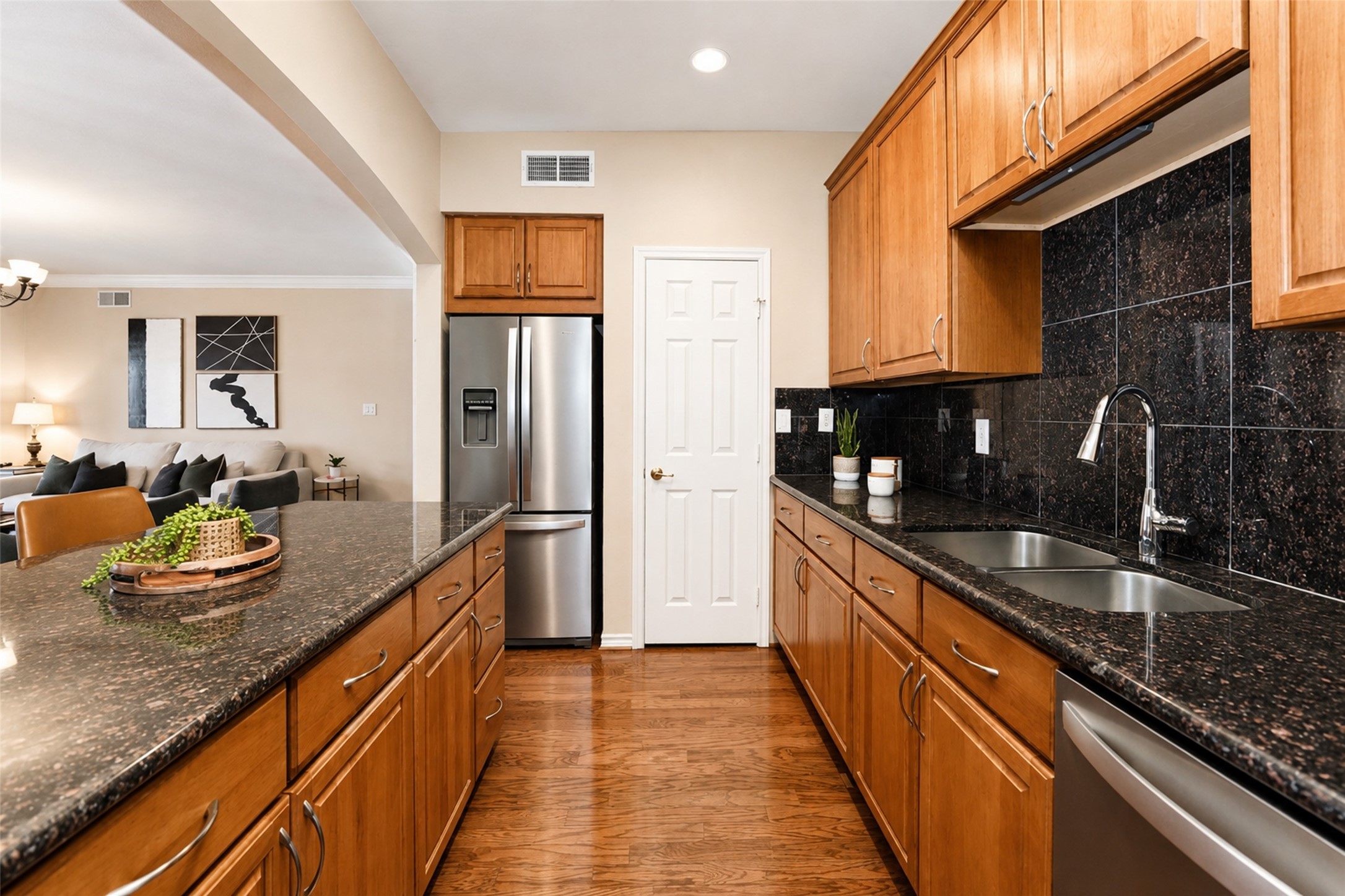 2400 McCue Road, Unit 401 Houston, TX 77056 - Photo 6 of 47 Kitchen showing pantry and island view. Home is fully furnished.