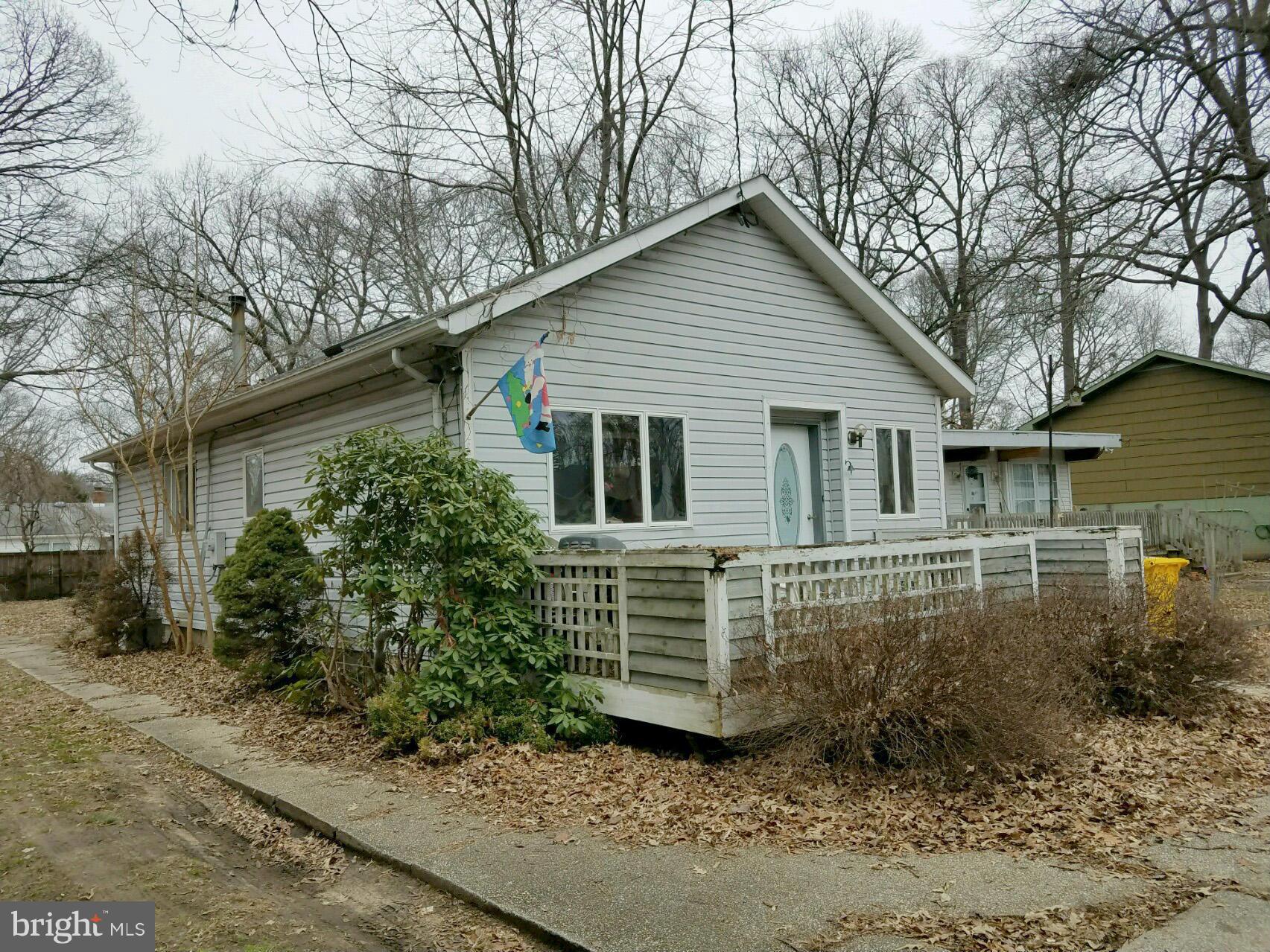 318 Dorchester Road Pasadena, MD 21122 - Photo 1 of 11 a view of house with a yard