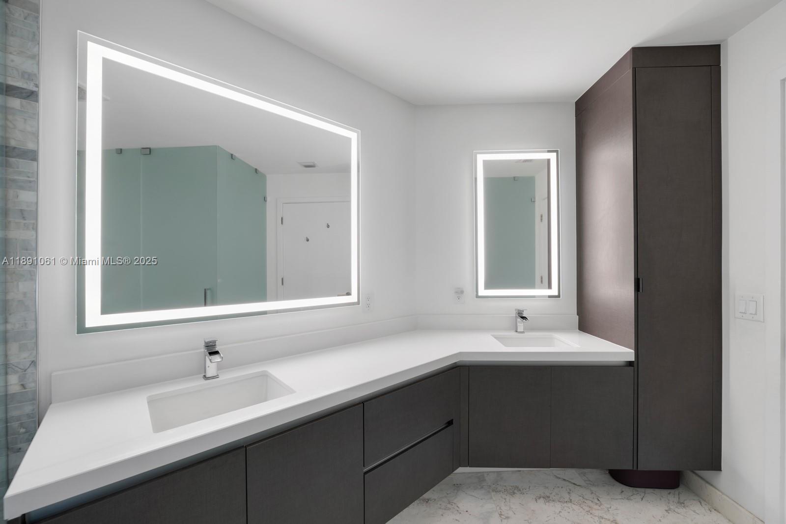 851 Northeast 1st Avenue, Unit 4403 Miami, FL 33132 - Photo 11 of 31 a bathroom with a double vanity sink mirror and