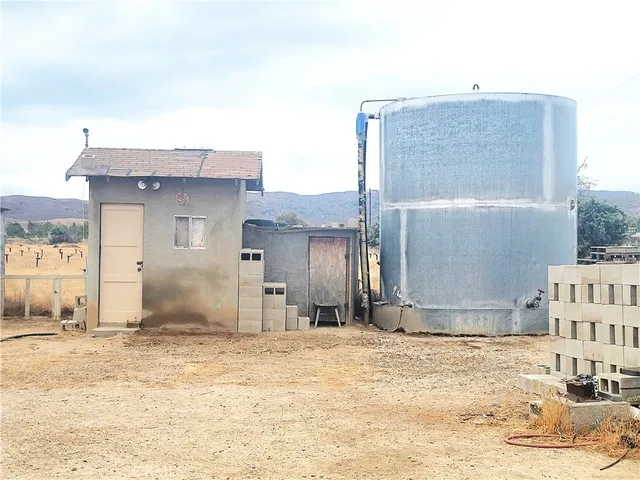 a view of swimming pool with a lake view and mountain view