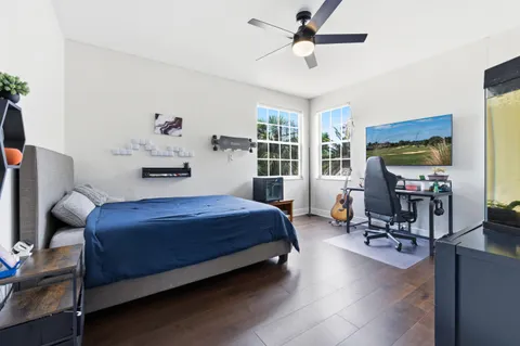 a bedroom with a bed and furniture