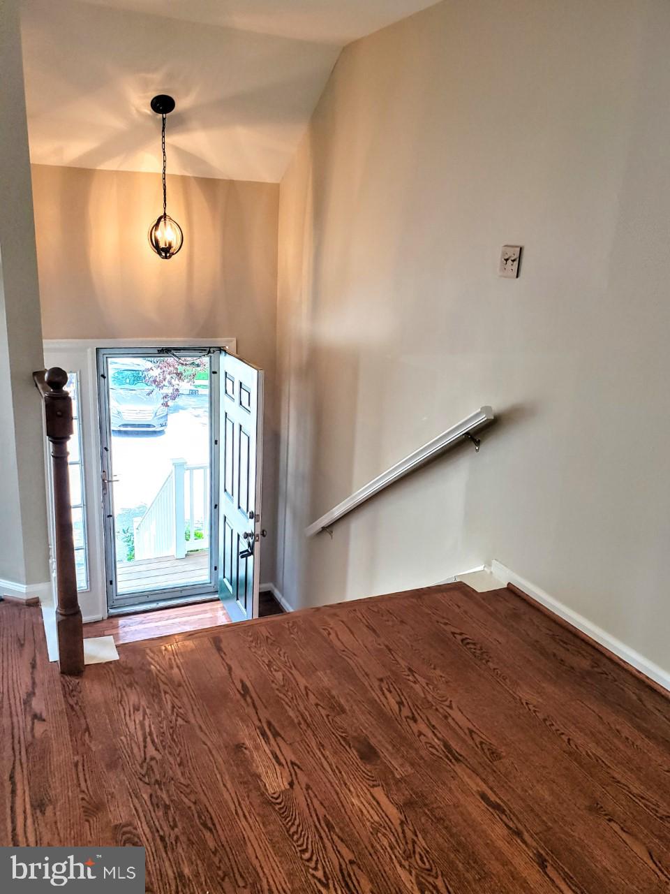 109 Harbour Ridge Lane Downingtown, PA 19335 - Photo 2 of 16 a view of a room with wooden floor and windows