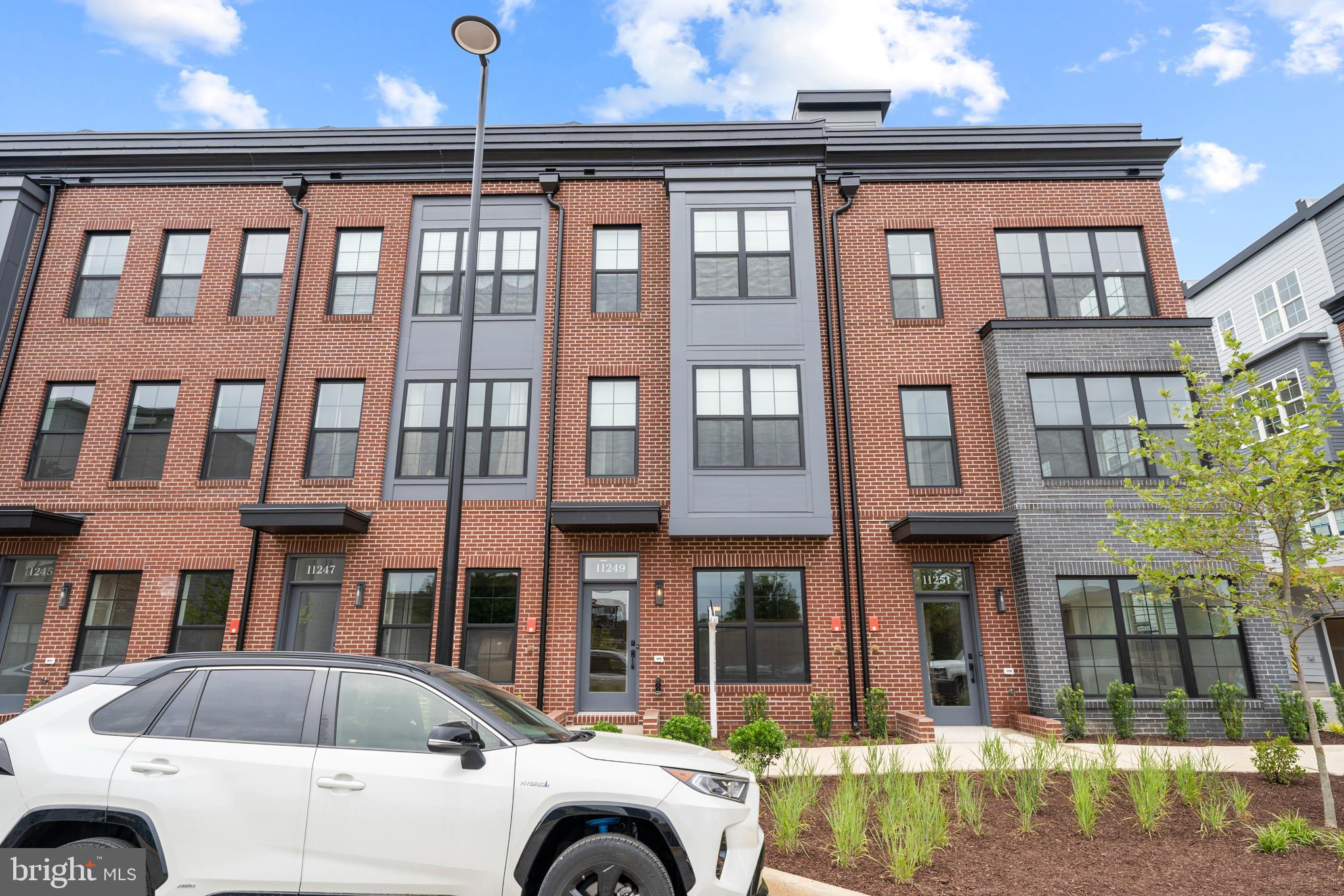 11249 Beaker Street Reston, VA 20190 - Photo 1 of 32 a view of multiple house