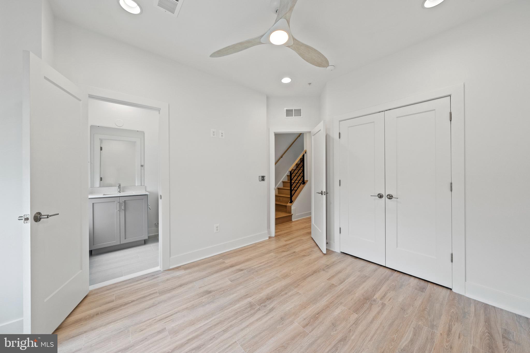 11249 Beaker Street Reston, VA 20190 - Photo 17 of 32 a view of a room with a sink and a refrigerator