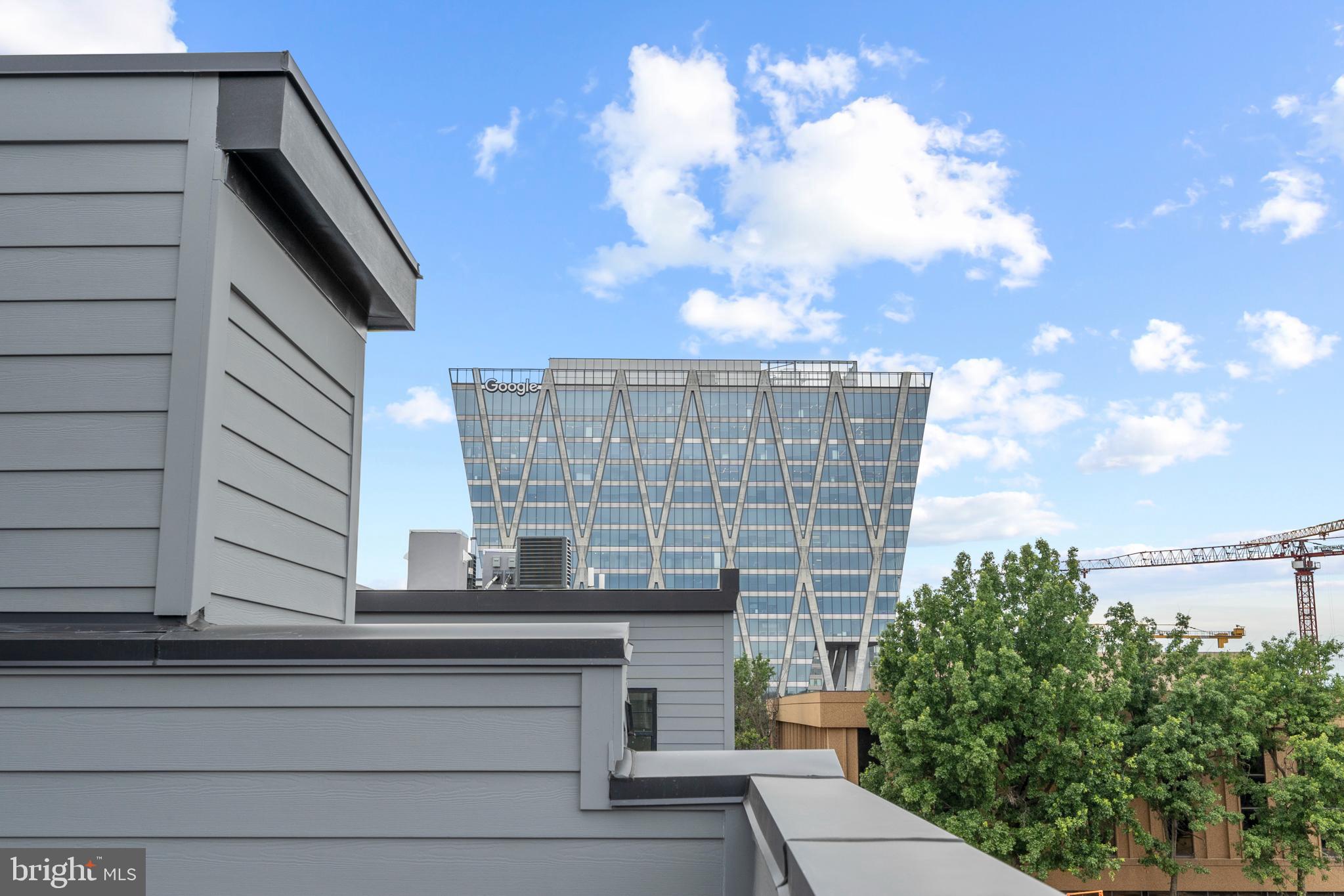 11249 Beaker Street Reston, VA 20190 - Photo 25 of 32 a front view of a house with a yard