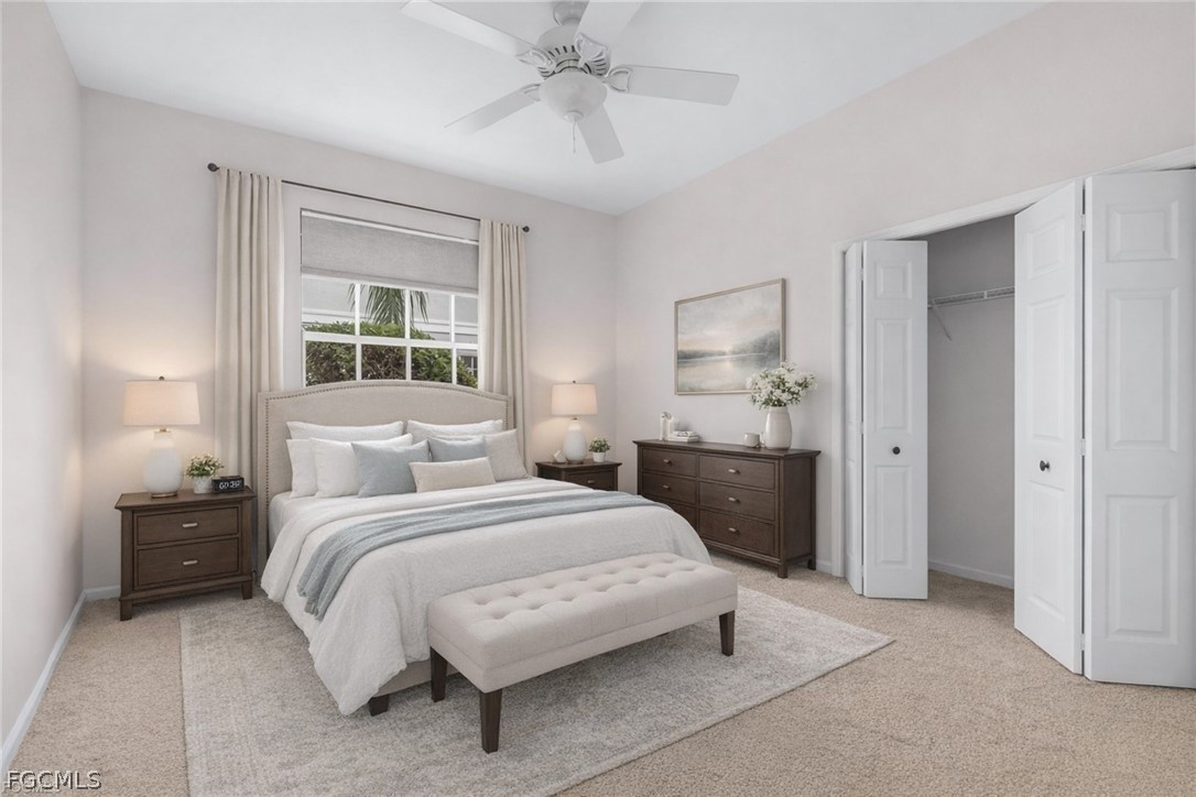 13110 Pebblebrook Point Circle, Unit 102 Fort Myers, FL 33905 - Photo 15 of 35 a bedroom with a bed and a chandelier