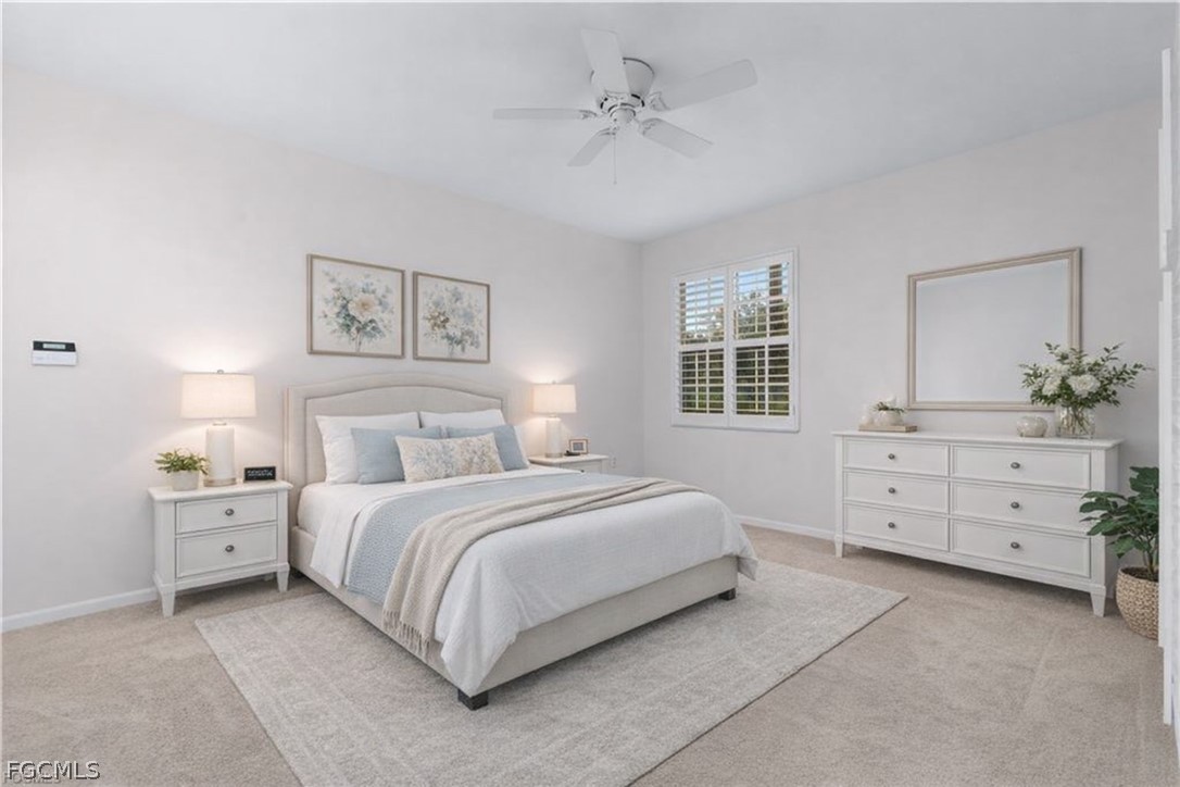 13110 Pebblebrook Point Circle, Unit 102 Fort Myers, FL 33905 - Photo 17 of 35 a bedroom with a bed and a dresser
