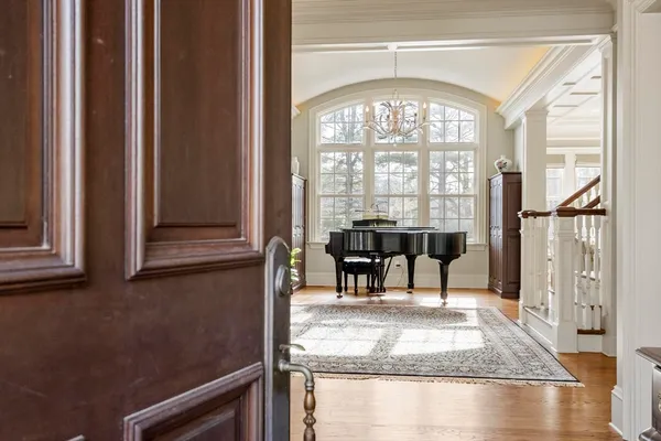 a view of a livingroom with furniture and a window