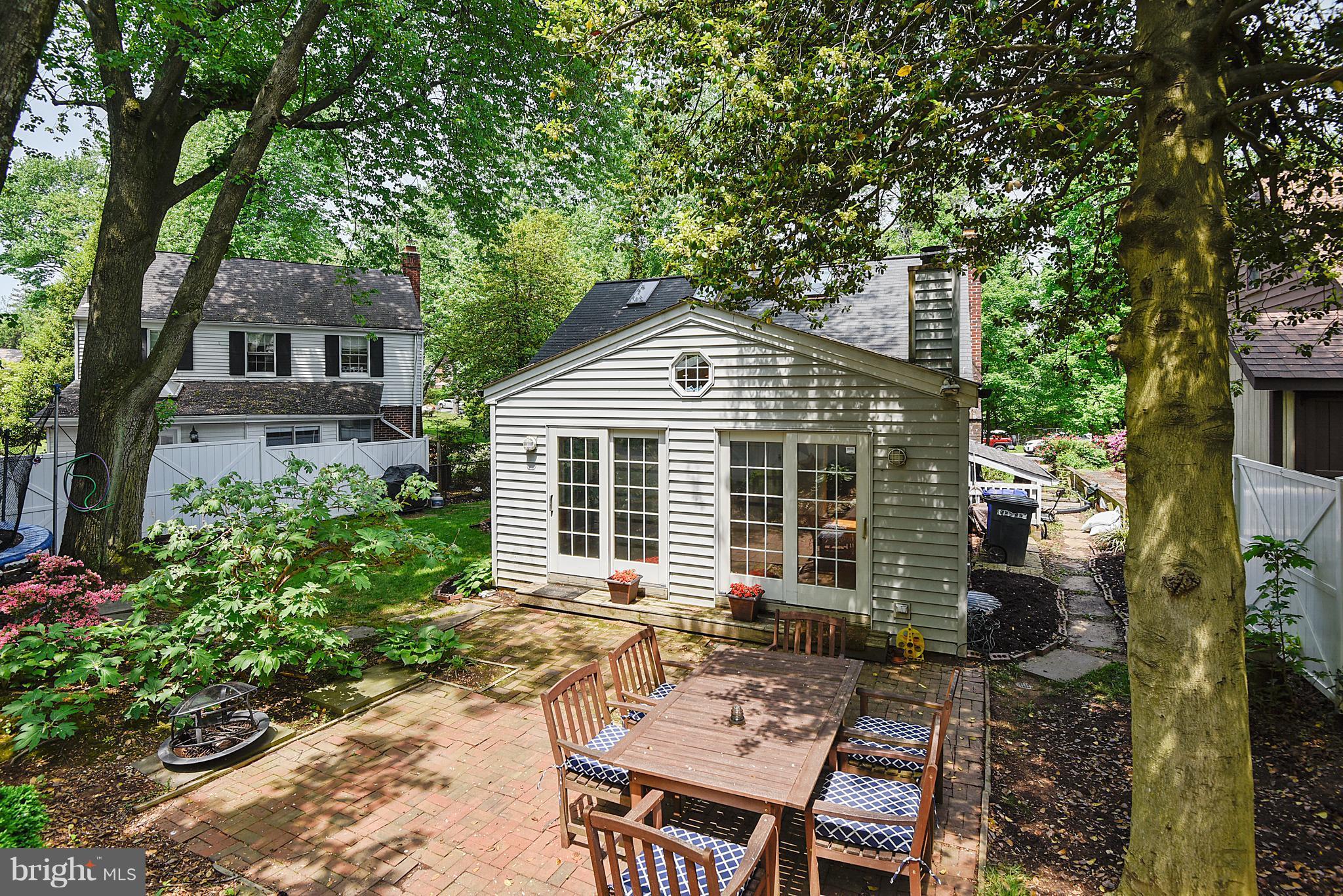 1912 Lansdowne Way Silver Spring, MD 20910 - Photo 22 of 28 a backyard of a house with outdoor seating