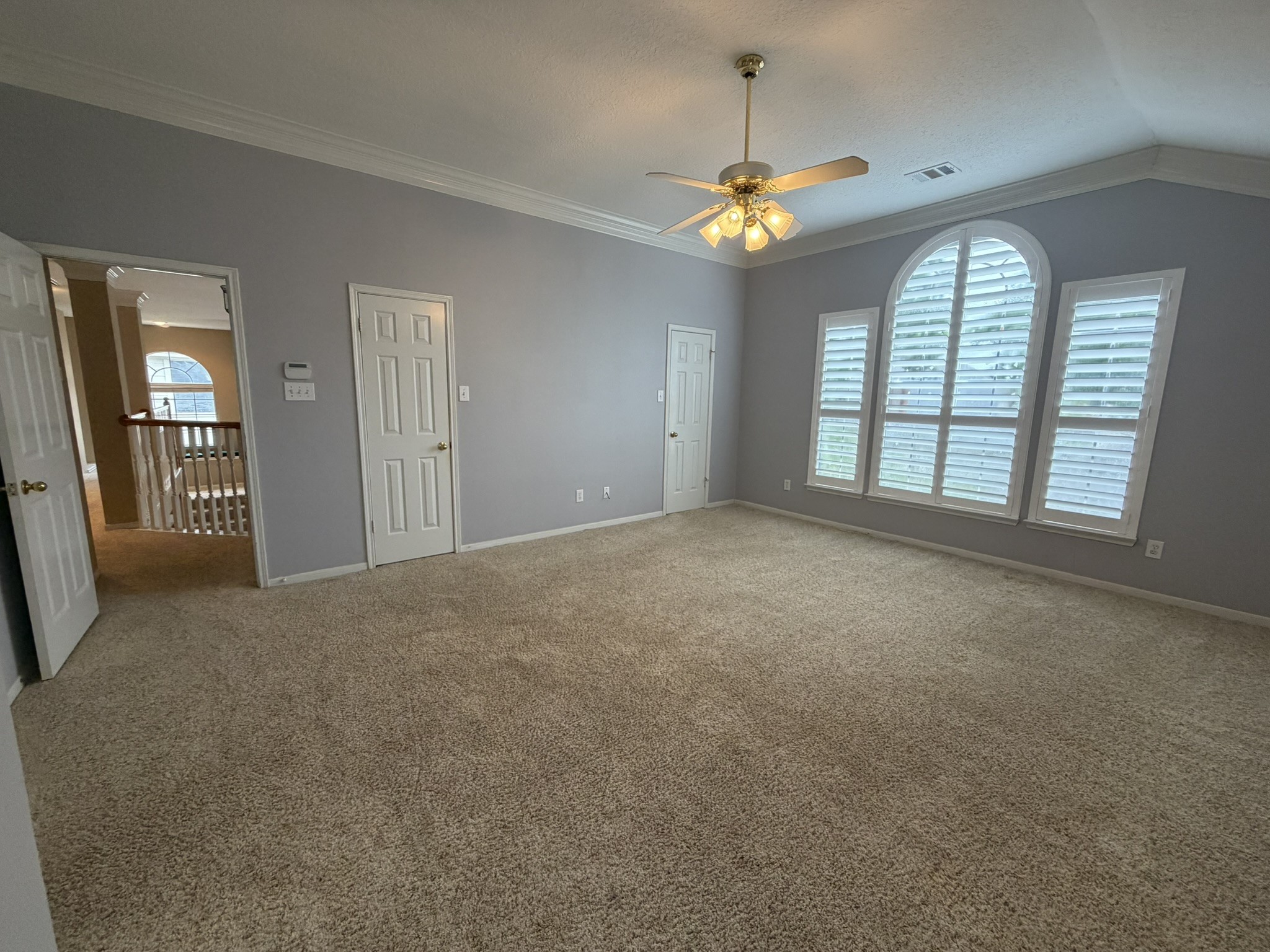 13810 Inland Spring Court Houston, TX 77059 - Photo 20 of 27 Primary bedroom with 2 closet access doors