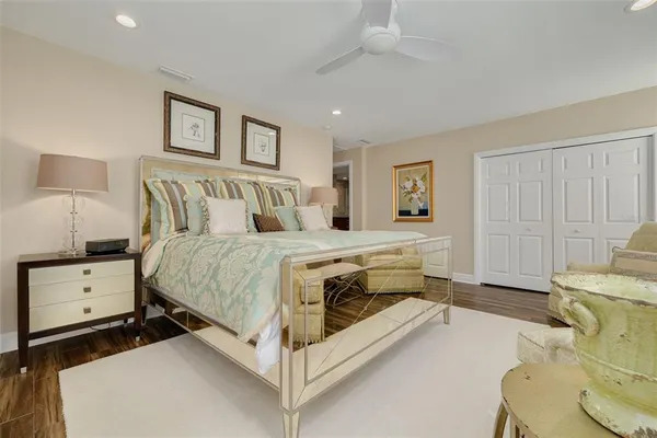 a bed room with a bed and a lamp