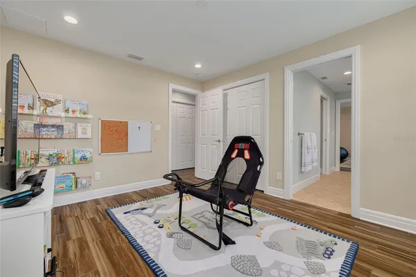 a living room with furniture and a rug