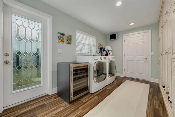 a utility room with dryer and washer