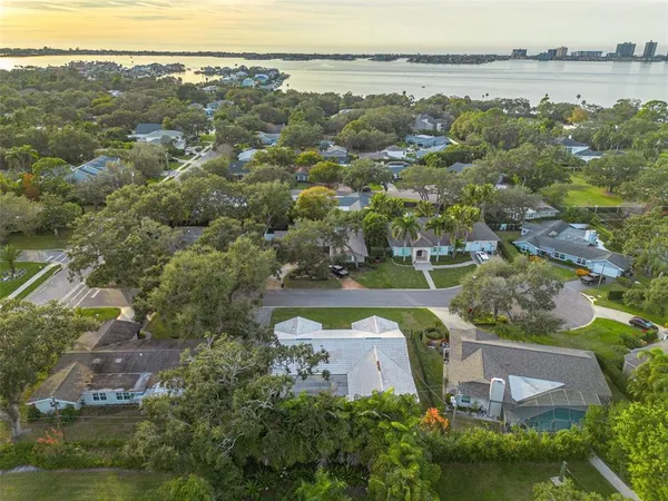an aerial view of a city with mountains