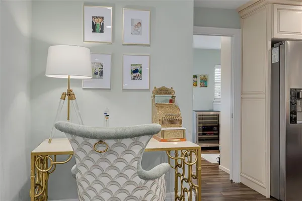 a view of dining room with furniture and wooden floor