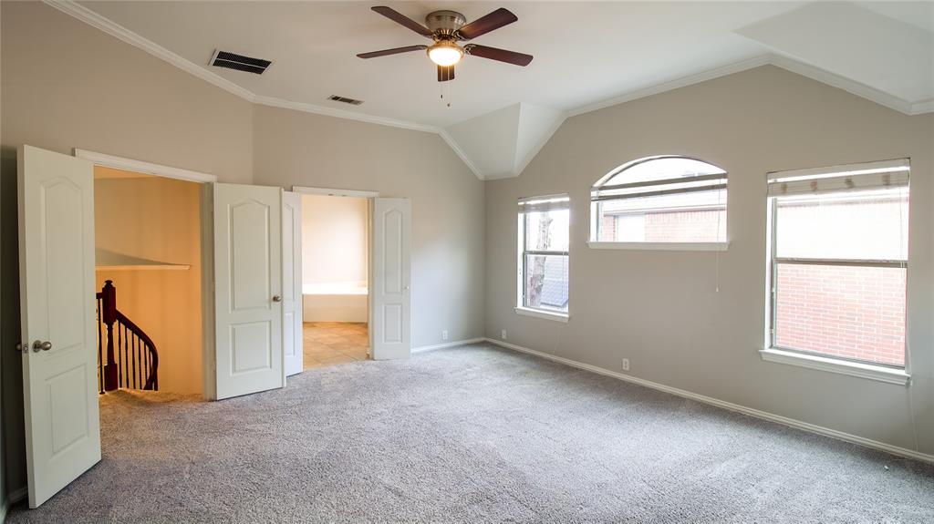 8698 Fisher Road Frisco, TX 75033 - Photo 17 of 33 a view of empty room with windows and ceiling fan