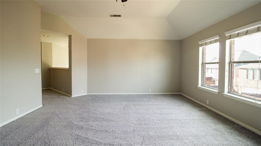 8698 Fisher Road Frisco, TX 75033 - Photo 23 of 33 an empty room with windows and closet