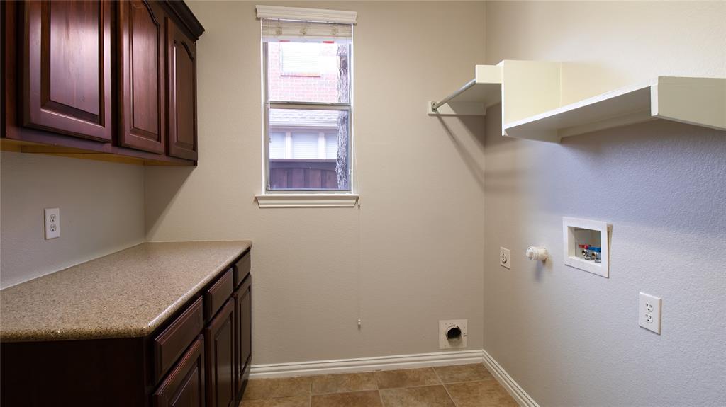 8698 Fisher Road Frisco, TX 75033 - Photo 24 of 33 a view of an empty room with window and stairs