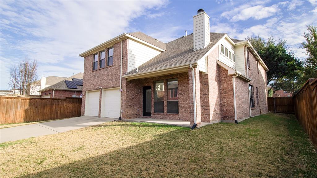 8698 Fisher Road Frisco, TX 75033 - Photo 25 of 33 a view of a house with a backyard