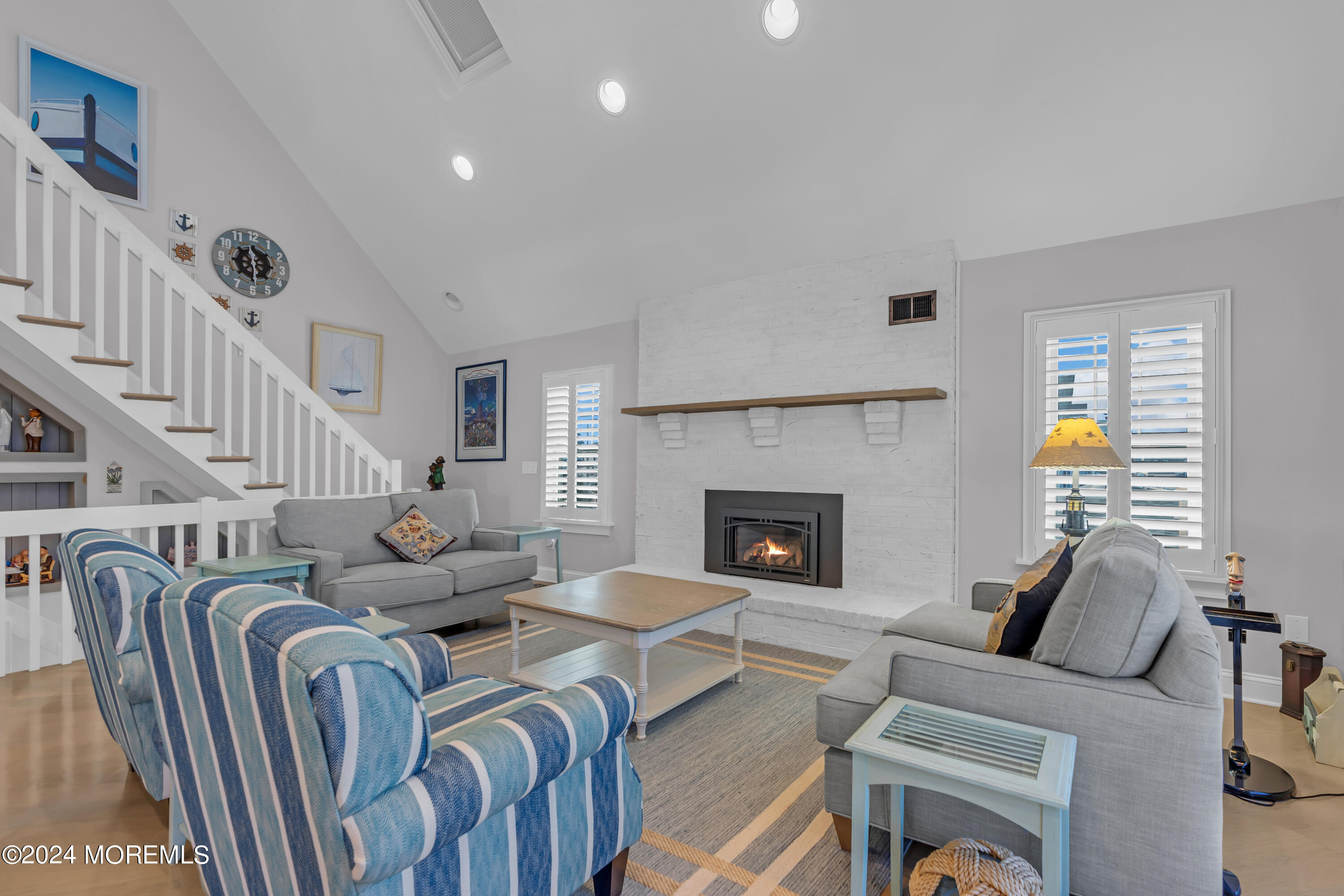 381 Aldo Drive Toms River, NJ 08753 - Photo 11 of 58 a living room with furniture and a fireplace